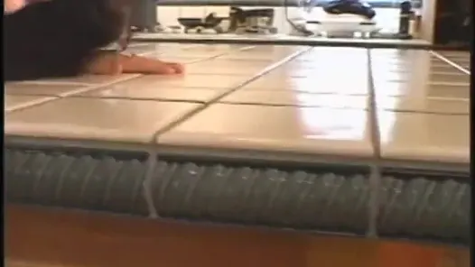 Tall brunette gets her hairy pussy pounded on the kitchen counter
